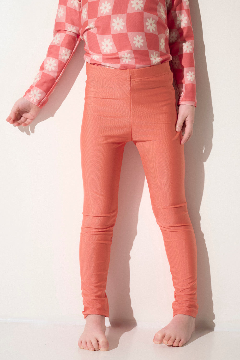 Legging de bain anti-UV rose pour fille, léger et confortable, offrant une protection solaire UPF 50+.