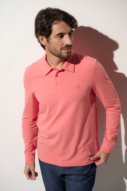 Polo anti-UV pour homme en rose, léger et doux, certifié UPF 50+ pour protection solaire efficace.