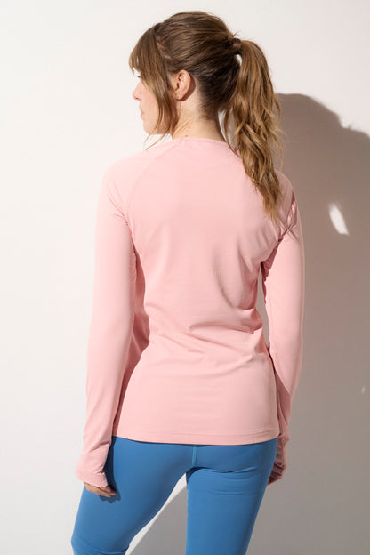 T-shirt anti-UV rose pour femme, manches longues UPF 50+, idéal pour le sport et la protection solaire.