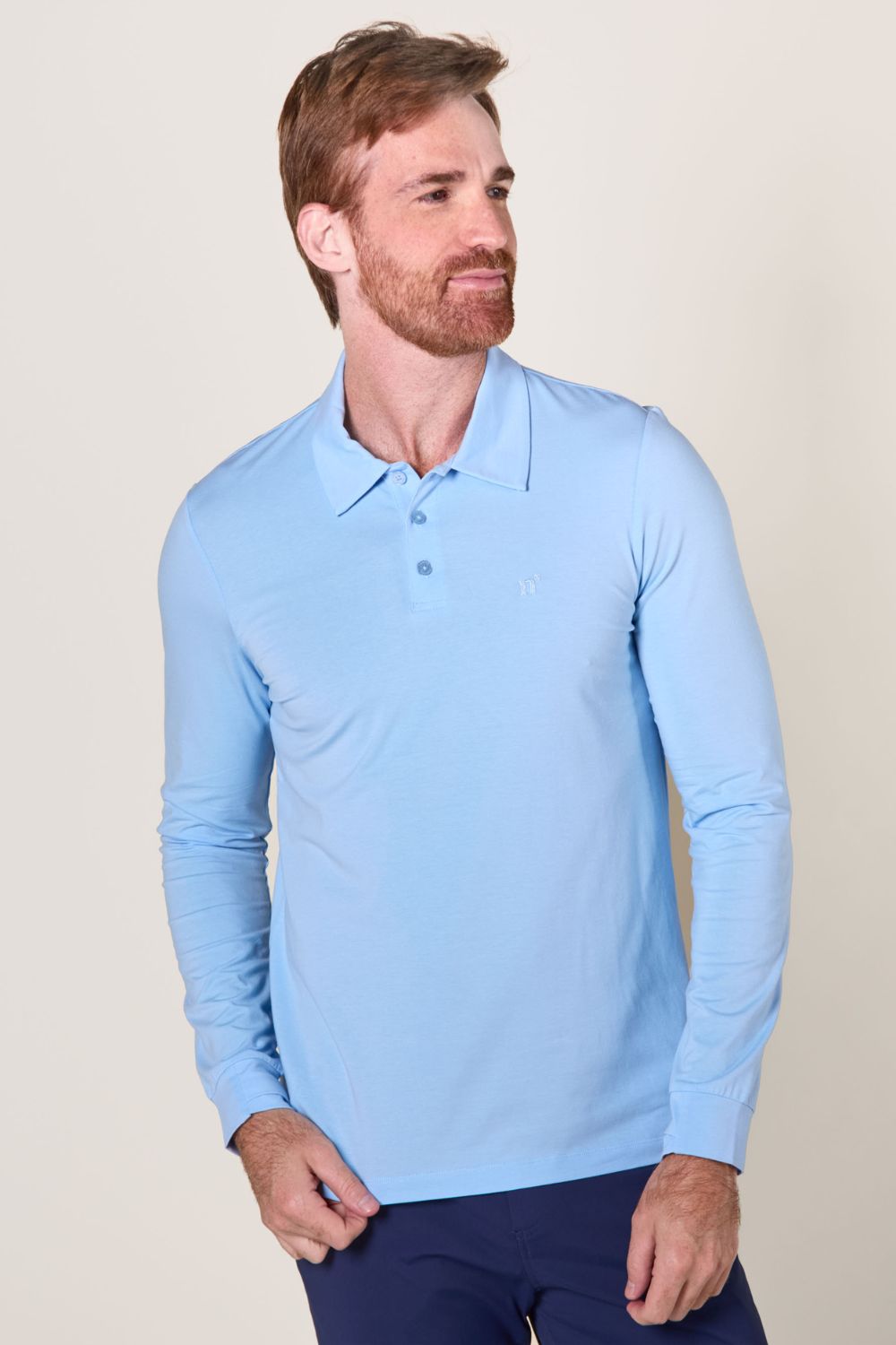 Polo anti-UV bleu clair pour homme, léger et élégant, certifié UPF 50+ pour une protection solaire efficace.