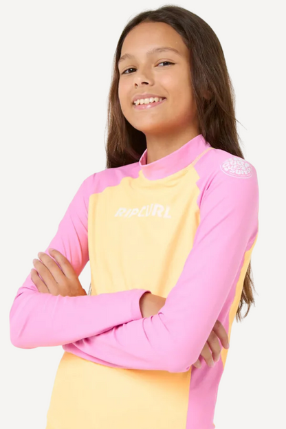 T-shirt de bain anti-UV Rip Curl, manches longues, rose et jaune, UPF 50+, pour enfant, idéal pour la plage.